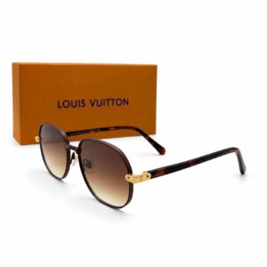 Lunettes de soleil de luxe de forme ronde Louis Vuitton pour femme avec verres dégradés marron, branches à motif écaille de tortue et charnières dorées ornées du logo LV, posées à côté de leur boîte de présentation orange.