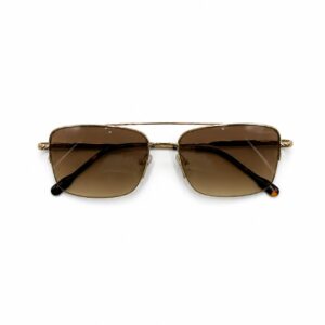 Lunettes de soleil Cartier pour homme avec monture aviateur dorée, double pont élégant, branches en métal torsadé style Trinity et manchons en acétate écaille de tortue. En arrière-plan, l'écrin rouge signature de la marque Cartier.